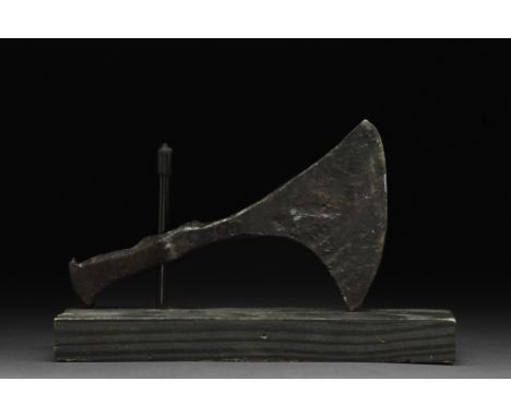 Ca. 900-1000 AD.A bearded type of iron axe with a blade extending downward, below the butt of the axehead, providing a longer