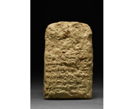Ca. 2000 BC.A rectangular-section ceramic tablet with rounded edges and corners, bearing cuneiform script to both faces in pa