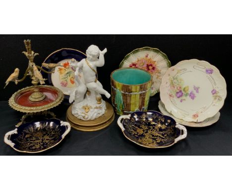 A Viennese bronze metal Figural Epergne, with  parakeets, 31cm high, a Blanc de chine type figure of goose and cherub, wooden