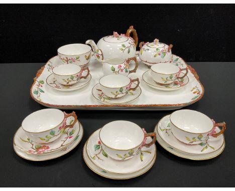 A mid 19th century cabaret tea service for six by Edwin J.D.Bodley of Burslem comprised of; a tea pot, milk jug, sugar bowl, 