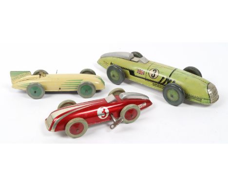 3 CHAD VALLEY 1920s style racing cars. one in red and chrome with No.3 to each side, with clockwork motor, another in cream w