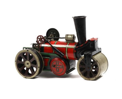 A possibly German produced tinplate road roller, finished in red and green, has a clock work motor that need s some attention
