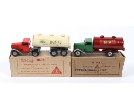 2 Tri-ang Minic Clockwork Lorries. An Articulated Milk Tanker. An example with a red tractor unit with plated mudguards, crea