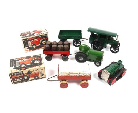 6 Tri-ang Minic. A Farm Tractor in green, boxed. 2 farm trailers, both red, one with round rubber tracks and one with 8 barre