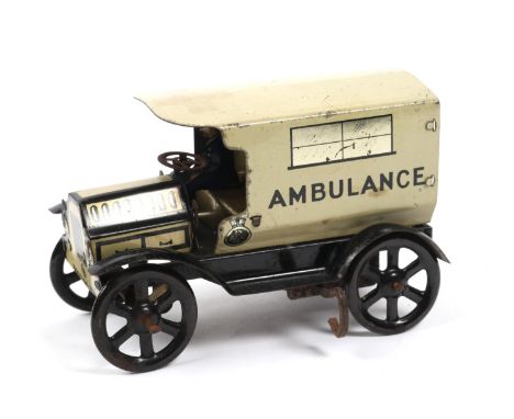 A scarce Wells of London (Wells Brimtoy) early pre-war wind up Tinplate Ambulance finished in cream with black chassis, and d