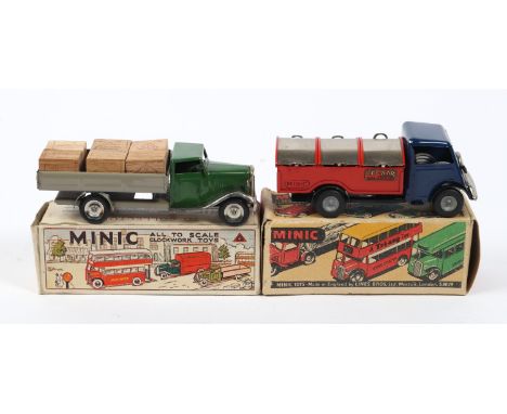 2 Tri-ang Minic Clockwork Lorries. A Delivery Lorry &amp; Cases. Dark green cab, plated mudguards and wheels, grey rear chass