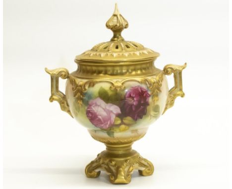 Royal Worcester pedestal vase, globular body painted with roses, gilt relief detail and handles, pierced cover with spire fin