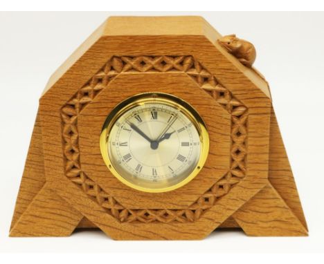 Robert Mouseman Thompson of Kilburn - an octagonal oak mantel clock, circular Roman dial with brass bezel in cross carved bor