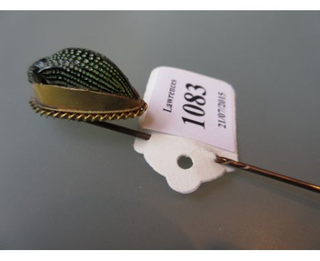 19th / early 20th Century scarab beetle mounted on a yellow metal stick pin