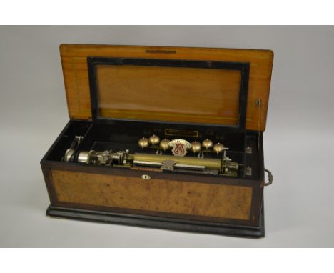 Fine and large 19th Century Swiss musical box, the rosewood crossbanded burr walnut case enclosing a lever wind movement with