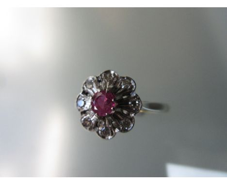 18ct Gold diamond and ruby cluster ring