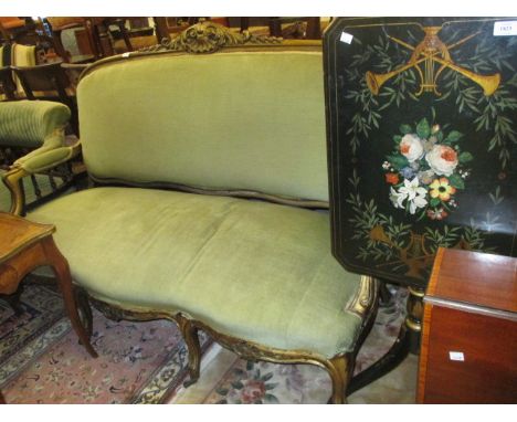 19th Century French carved giltwood and green upholstered sofa raised on cabriole front supports