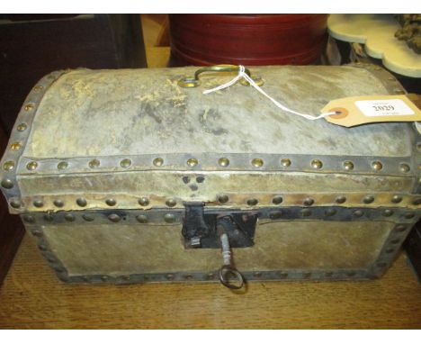 Small antique pony skin and brass stud work trunk with dome top, brass handle, original lock and key