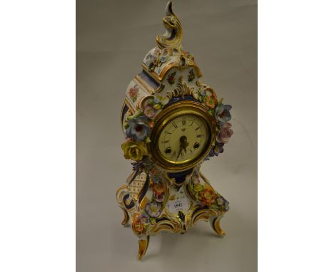 Modern Continental porcelain mantel clock with floral encrusted decoration