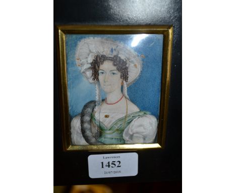 19th Century English school, watercolour portrait miniature of a lady wearing a lace bonnet and green dress and ebonised gilt