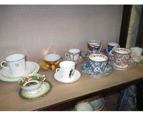 Group of eight 20th Century Russian porcelain teacups with saucers, hand decorated in St. Petersburg, together with two Conti