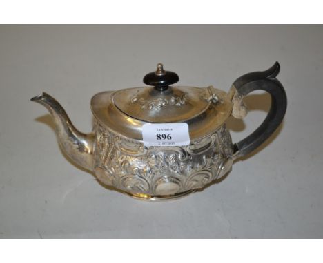 Victorian silver bachelor's teapot of oval embossed design