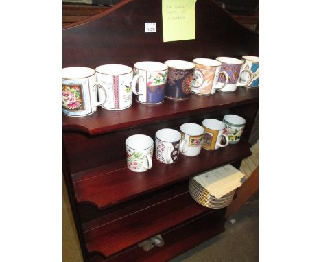 Set of twelve modern Coalport coffee cups and saucers decorated with various 19th Century designs together with a purpose mad