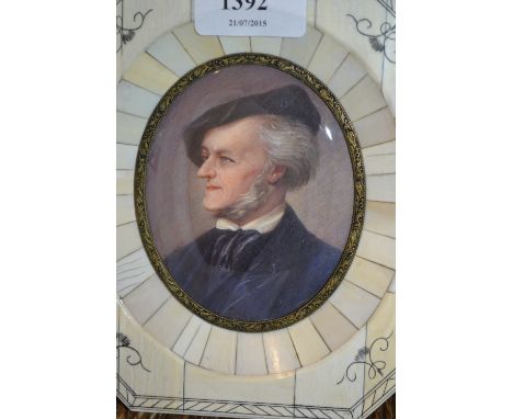 Continental watercolour head and shoulder portrait miniature of a man in a blue velvet jacket, indistinctly signed, 3.5ins x 