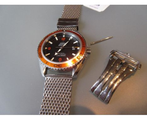 Gentleman's Omega Seamaster Planet Ocean professional co-axial chronometer wristwatch with black dial, orange bezel and later