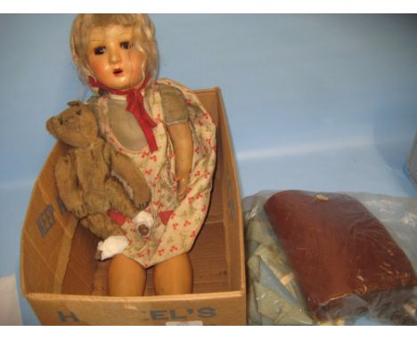 20th Century composition doll, 21ins high and an early 20th Century small Steiff articulated teddy bear with button, 9ins hig