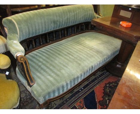 19th Century burr walnut line inlaid and ebonised two seat sofa having padded and spindle back and overstuffed seat raised on