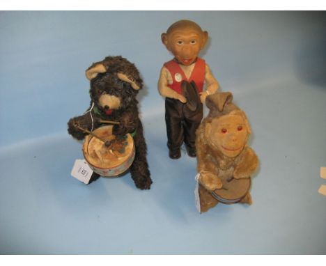 Three various clockwork figures, bear and monkey playing drums and monkey with cymbals