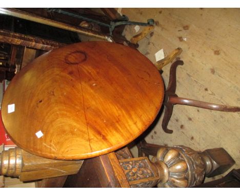 George III circular pedestal table, the tilt top above a turned column support and tripod base