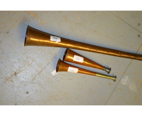 19th Century brass mounted copper post horn together with two small copper horns