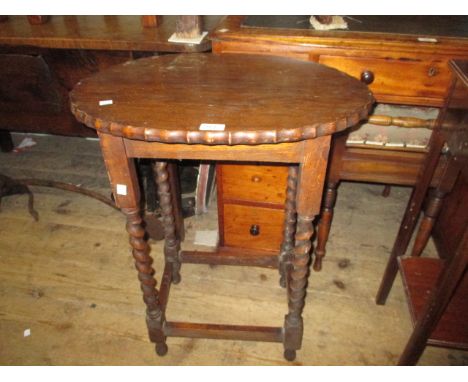 1930's Oak oval barley twist occasional table, together with an Art Deco mahogany book table