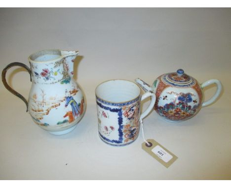 Chinese Imari coloured mug with floral enamel decoration together with a similar teapot and a 19th Century Chinese jug (handl