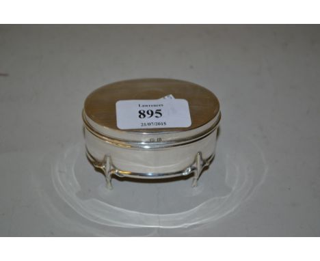 Birmingham silver oval trinket box with hinged engine turned lid enclosing a lined interior