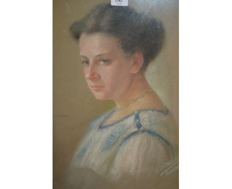 Early 20th Century German school, head and shoulder pastel portrait of a lady, signed indistinctly and dated 1916, 20.5ins x 