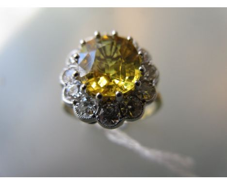 18ct Yellow gold oval yellow sapphire and diamond cluster ring