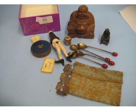 Small box containing a quantity of miscellaneous items including: carved wooden figure of a Buddha, purse, compact etc 