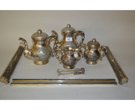 Mid 20th Century Vietnamese white metal (900 mark) tea service comprising: two teapots with covers, sugar bowl with cover, cr