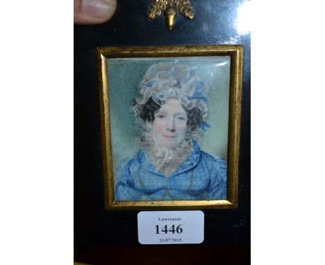 19th Century English school, watercolour, portrait miniature of a lady wearing a blue dress in an ebonised and gilt frame