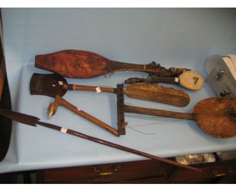 Native wooden spear, hand axe and five musical instruments
