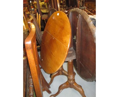 18th Century fruitwood pedestal table, the tilt top above a baluster turned column support and tripod together with a pair of