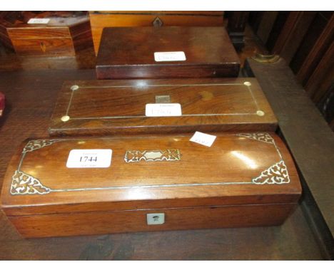 Victorian rosewood and mother of pearl inlaid glove box with dome lid, another similar and a rosewood two division tea caddy