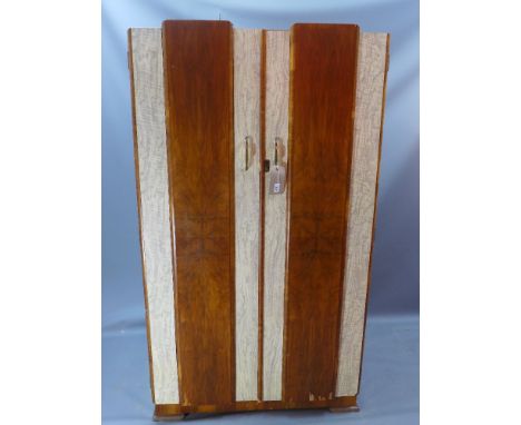 An Art Deco walnut wardrobe bearing label which reads 'This is a Rosbros Production D. Ross (furniture) LTD. The doors with f