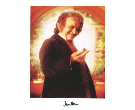 Ian Holm signed 12x8 colour photograph featuring Holm as he played Bilbo Baggins from the Lord of the Rings trilogy. Good con