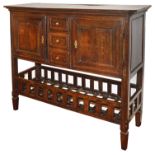 An early 19th century French provincial oak kitchen dresser