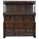 A late 17th century panelled oak press cupboard or tridarn