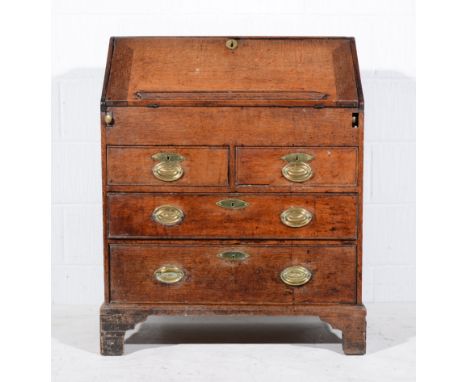George II oak bureau, of small proportions, with fall front enclosing fitted interior, above two short an two long drawers on