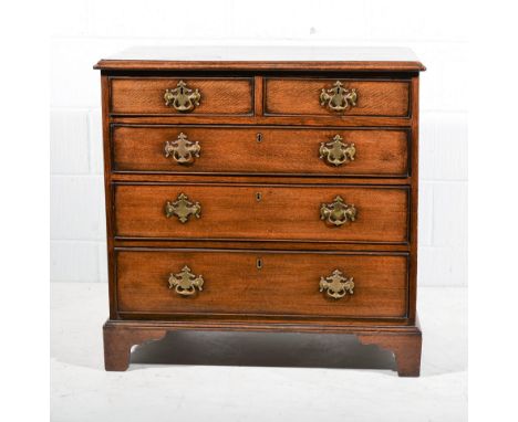 Georgian oak chest of drawers with mahogany cross-banding, two short over three long, bracket feet width 85cm, depth 51cm, he