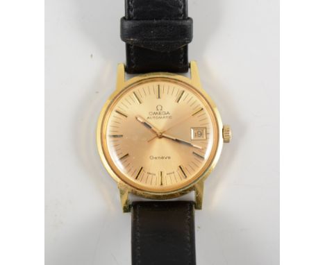 Omega - A gentleman's Automatic Geneve wrist watch, 32cm champagne baton dial with sweep seconds and date aperture in a gold-