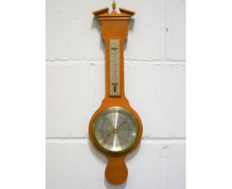 Oak cased barometer, by Comitti, London, 51cm.