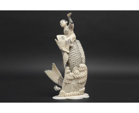 antique Japanese Meiji period "Boy sitting on a fish" sculpture in ivory with European CITES certificate "2024/BE04179/CE"Thi