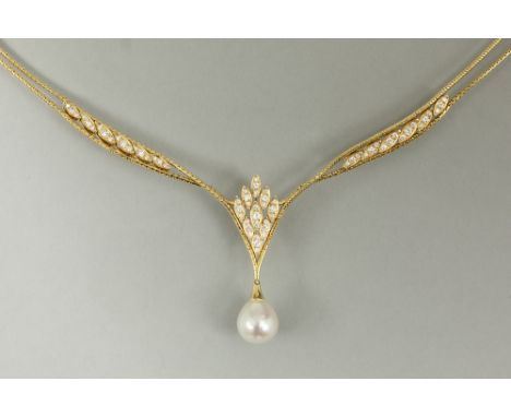 elegant necklace in yellow gold (18 carat) with ca 1 carat of very high quality brilliant cut diamonds and with a beautiful S